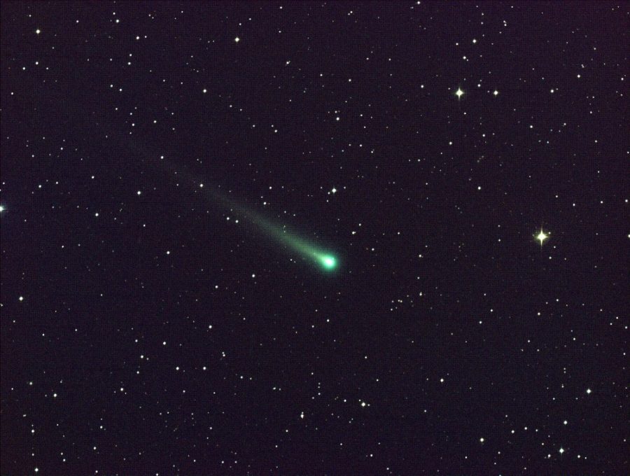 Comet ISON shines in this five-minute exposure taken at NASAs Marshall Space Flight Center on Nov. 8 at 5:40 a.m. EST. A researcher proposed that a comet caused the mysterious Wow! Signal from outer space, but other scientists remain unconvinced.