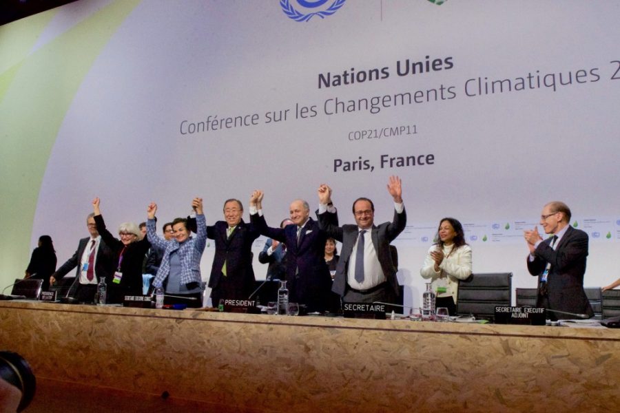 French+Foreign+Minister+Laurent+Fabius%2C+the+President+of+the+COP21+climate+change+conference%2C+celebrates+along+with+United+Nations+Secretary-General+Ban+Ki-moon+and+French+President+Francois+Hollande+on+Dec.+12%2C+2015+after+representatives+of+196+countries+approved+a+sweeping+environmental+agreement+during+a+multinational+meeting+at+LeBourget+Airport+in+Paris%2C+France.+The+recent+U.S.+pullout+from+the+agreement+prompted+responses+from+a+number+of+states+independently.