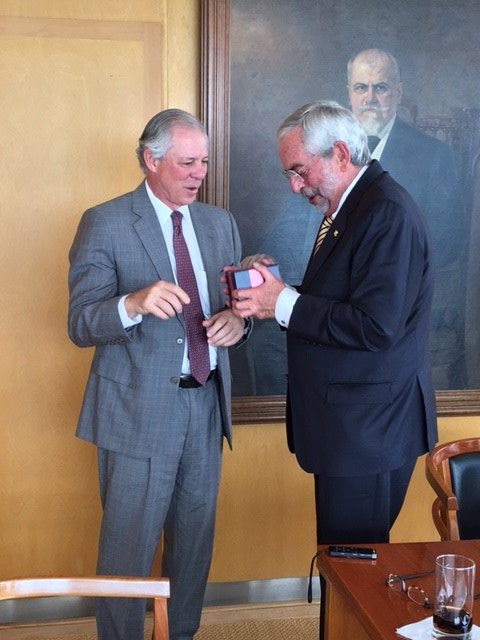 UA President Dr. Robert Robbins exchanges a gift with Enrique Graue Wiechers, dean of La Universidad Nacional Autónoma de México, during a trip to Mexico City in July. Robbins said he spoke with Graue Wiechers about a continued partnership with UNAM in a July 26 tweet.