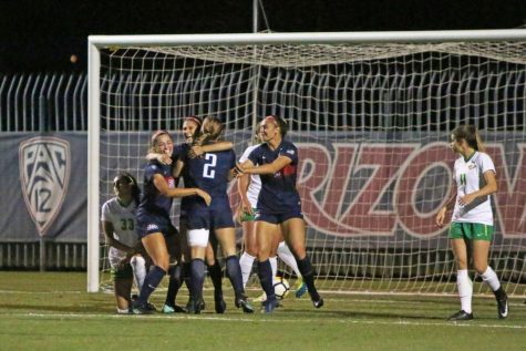 Arizona players celebrate after a goal by defender Samantha Falasco on Sept. 23.