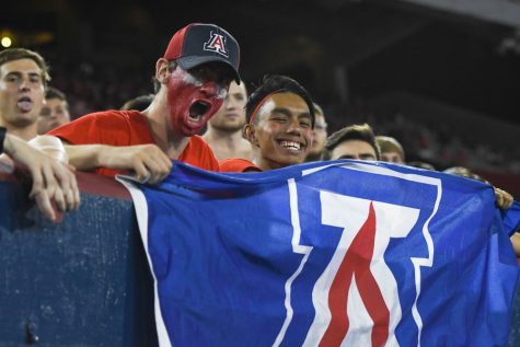 Arizona fans in Zona Zoo cheer on the Wildcats during their season opener against NAU on Sept. 2.