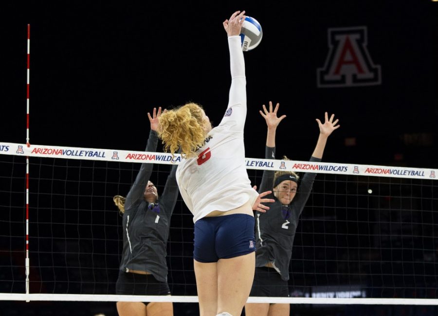 UAs Katie Smoot hammers home the ball against GCU on Friday, Sept. 1.