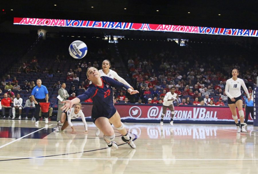 Arizonas Makenna Martin (22) reaches for the ball during the UA-Stanford volleyball game on Oct. 29.