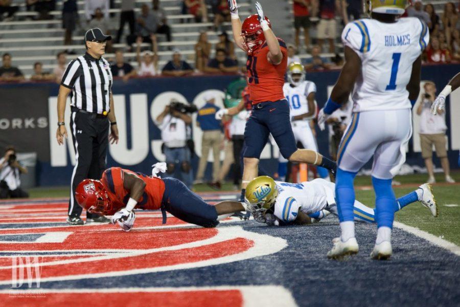 Arizonas DJ Hinton scores a touchdown against UCLA during the UA-UCLA game on Saturday, October 14.