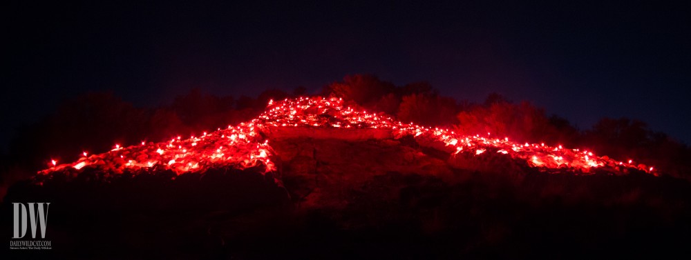 Flares light up the A on Sentinel Peak, signifying the beginning of Homecoming week.