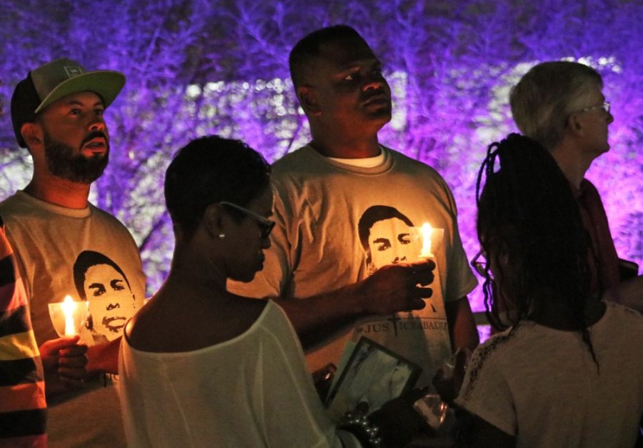 An attendee of the Eller School of Managements vigil for Bakari Henderson, a recent UA graduate who passed away. An open letter from the Henderson family stated that their goal was to keep Bakaris story alive.