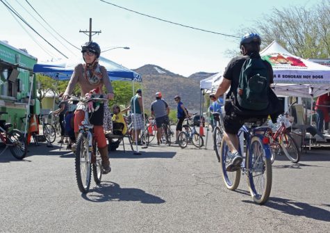 Cyclists ride down colorful neighborhood streets and check out fun tents containing DJs, coffee, ice cream, street tacos and local sustainability initiatives at Cyclovia on April 2. This season's route takes riders through the City of South Tucson.