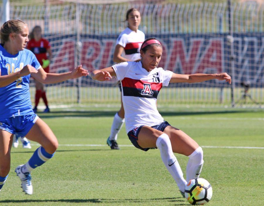 Arizona+defender+Sabrina+Enciso+%2816%29+keeps+the+ball+away+from+a+UCLA+player+on+Oct.+8.%26nbsp%3B