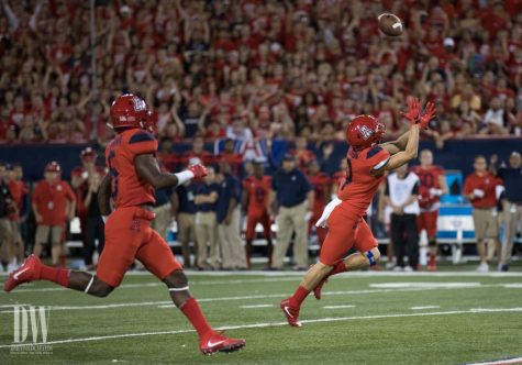 Arizona's Tony Ellison reaches for a pass during the UA-Washington State game on Saturday, October 28.