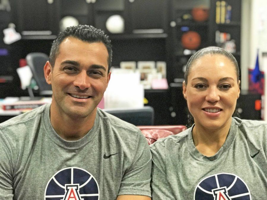 UA womens basketball coach Adia Barnes, right, with husband and assistant coach Salvo Coppa, left, pose for a photo after the first womens basketball practice of the season.