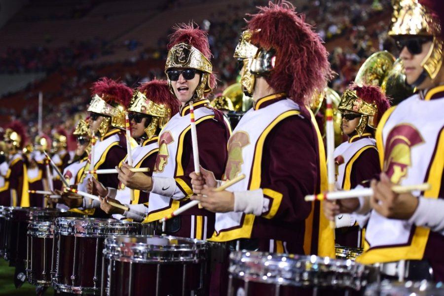 Members of the USC Trojans marching band celebrate after a 38-30 win at the Los Angeles Coliseum in 2015.