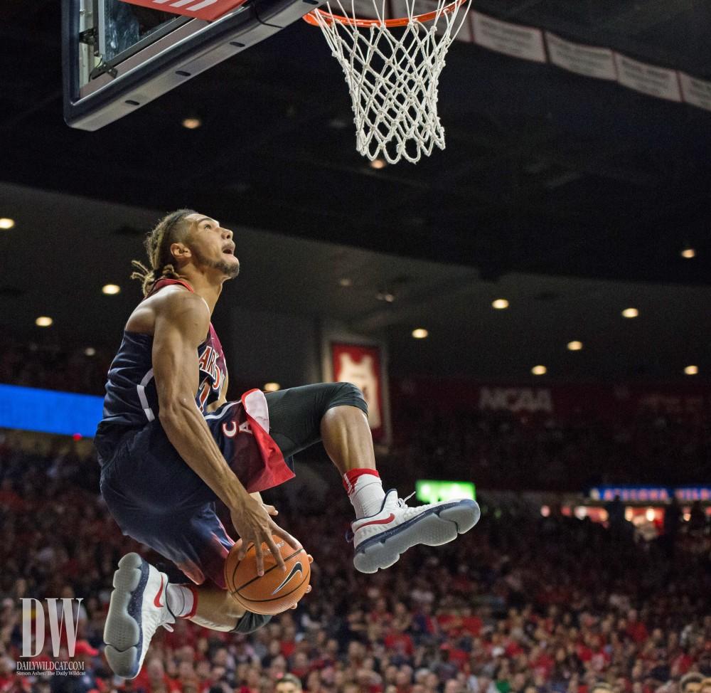 Keanu Pinder tries a between-the-legs dunk during the Red-Blue contest on Oct. 20.