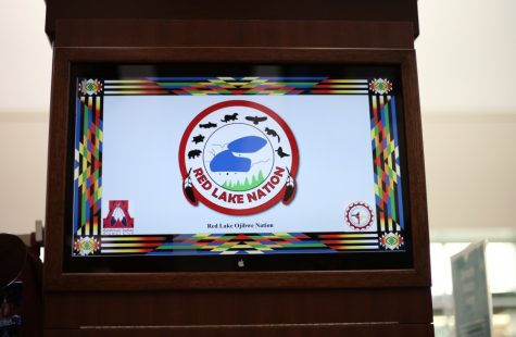 The presentation of the Red Lake Ojibwe Nation's flag on the UA bookstore's circulating screen that displays Native American Tribe Flags in honor of Native American Heritage month.