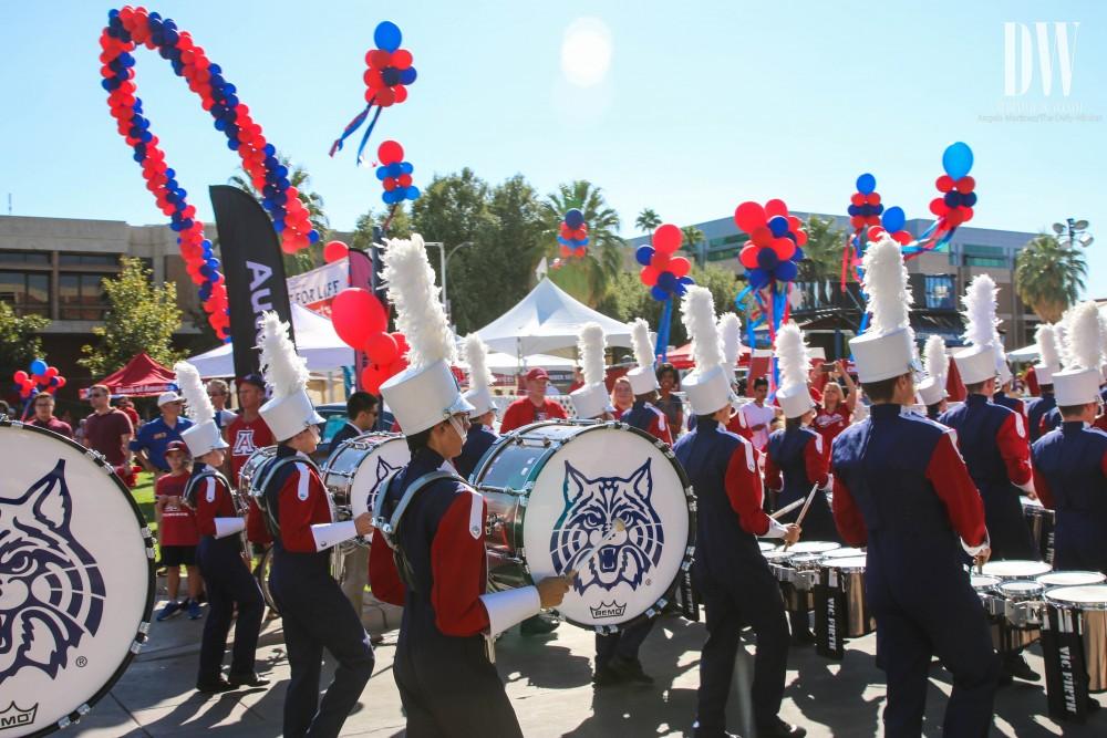 The Pride of Arizona marches in the homecoming parade around the UA mall on Oct. 28.