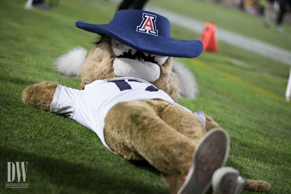 Wilbur the Wildcat snoozes peacefully amidst jeers and booes from the USC crowd.