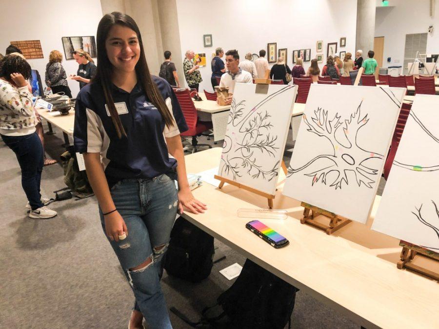 Artist+Allie+St.+Paul+presenting+her+interactive+neuron+canvas.+St.+Paul%26%238217%3Bs+canvas+was+the+only+piece+that+was+unfinished+and+interactive.+Artist+St.+Paul+presenting+her+interactive+neuron+canvas.+St.+Paul%26%238217%3Bs+canvas+was+the+only+piece+that+was+unfinished+and+interactive.%26nbsp%3B