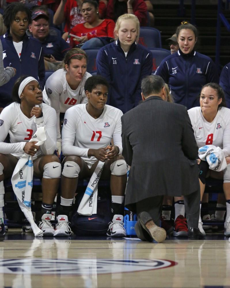 Arizona head volleyball coach Dave Rubio talks to his team during the Wildcats' match with the Oregon State Beavers on Nov. 9 in McKale Center. The Wildcats lost 0-3 to the Beavers.