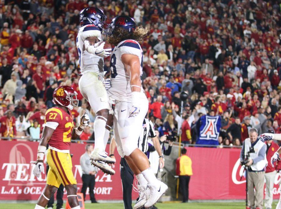 The+Arizona+Wildcats+celebrate+a+late+touchdown+against+USC.