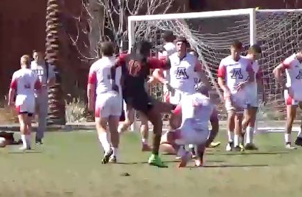 ASU rugby player Christopher Crawford kicks Doug Neary in the face on February 2017. 