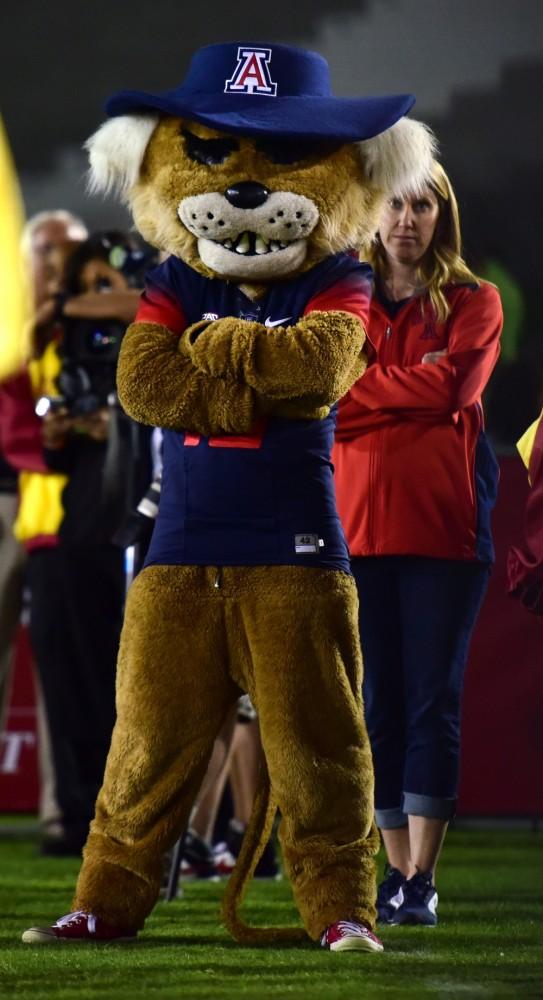 Wilbur stands alone and watches on as the Wildcats come up short against USC in 2015.