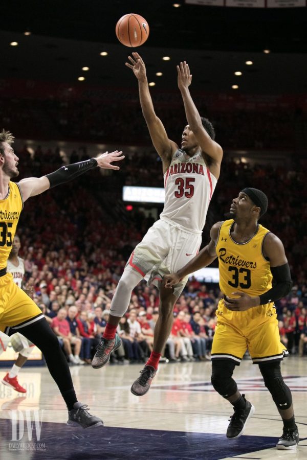 Allonzo Trier shoots a step-back jumper past a UMBC defender. Trier recorded 30 points in the game, splitting evenly with 15 in each half.