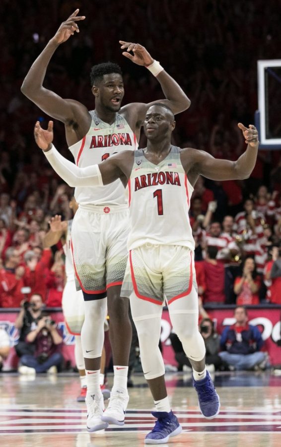Arizonas Rawle Alkins, right, and Deandre Ayton, left, pump up the crowd with only 1.3 seconds left on the clock after a clutch win against ASU.