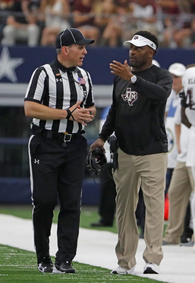 Texas A&M head coach Kevin Sumlin talks to a ref in the second quarter on Saturday, Sept. 23, 2017 in the Southwest Classic in Arlington, Texas. Texas A&M has fired Sumlin as head football coach. 