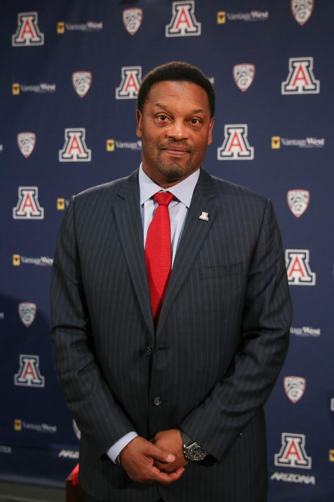 Kevin Sumlin, the newly hired head football coach, poses for a picture before an interview with the Daily Wildcat.