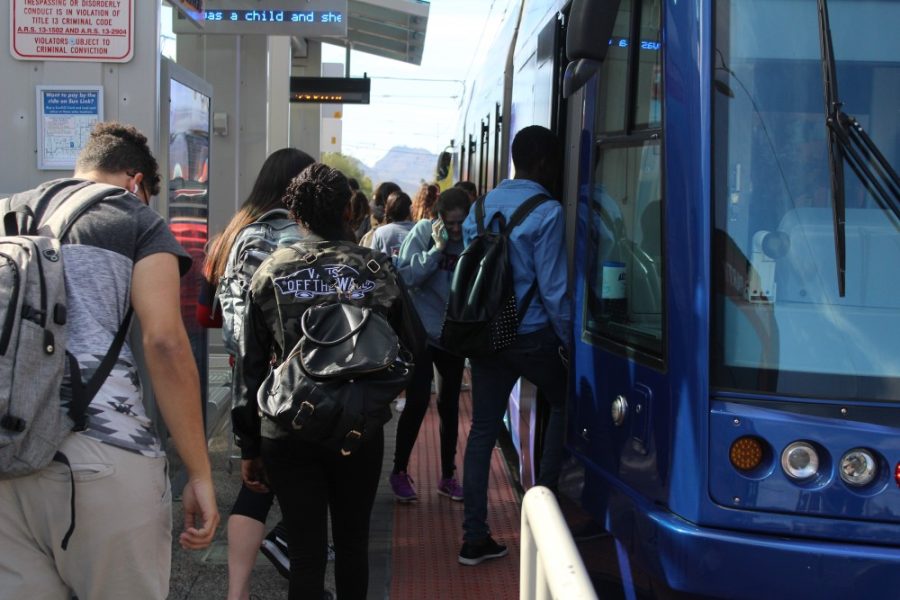 Students and other community members board the Sun Tran on Thursday, Jan. 25, 2018.