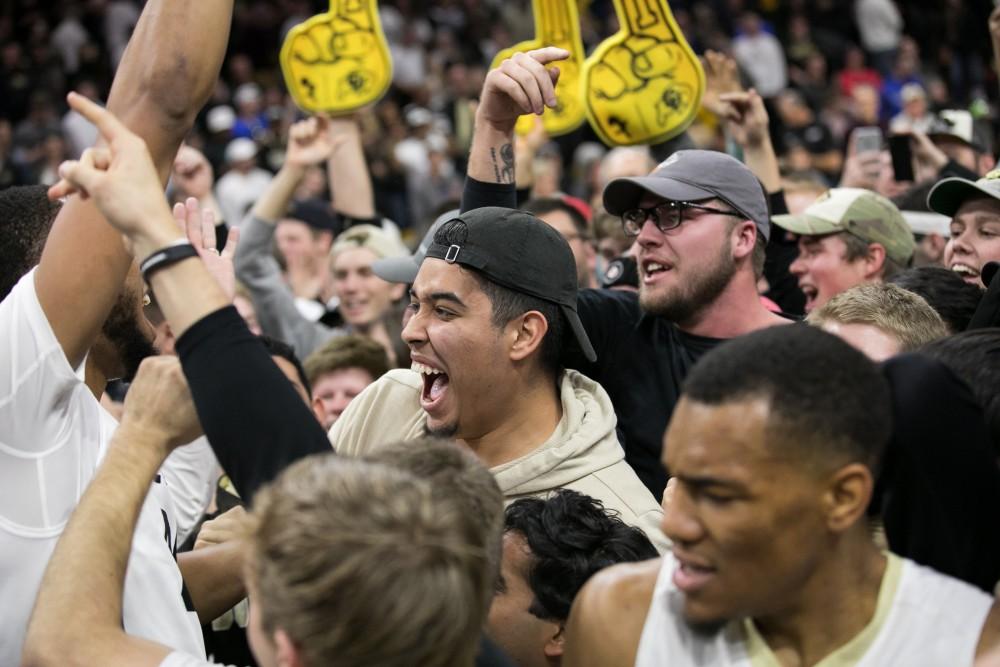 Colorado fans show their excitement and celebrate with the team after upsetting no. 14 ranked Arizona.
