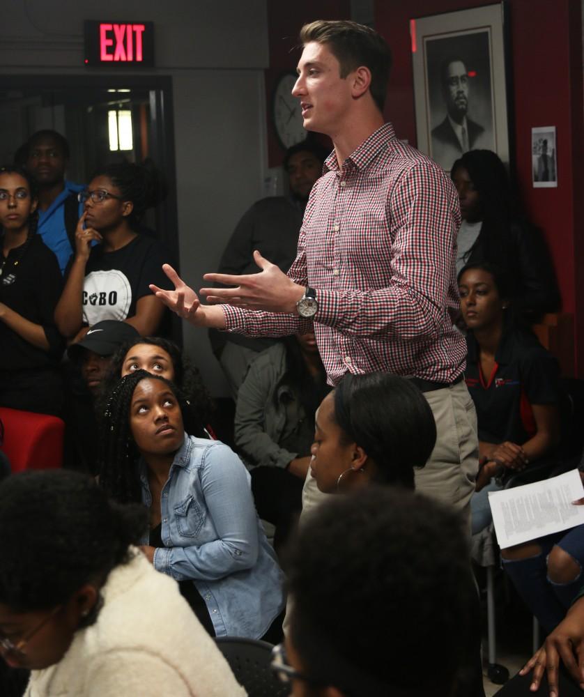  
Matt Lubisch, ASUA student body president, speaks to students from the African American Student Affairs Wednesday Jan. 25 at a meeting with President Robbins and UA administration. 