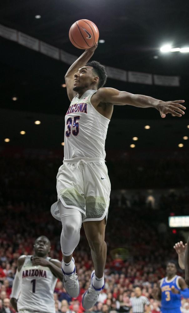 Arizona's Allonzo Trier jumps to dunk the ball during the UA-UCLA game on Thursday, Feb. 8 at McKale Center in Tucson, Ariz. Trier ended the game with 17 points.