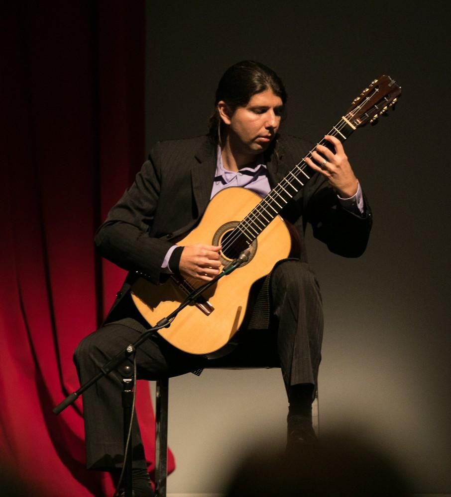Ricardo Camponogara de Mello performs before the fourth lecture in the "Humans, Data and Machines" series in Centennial Hall on Monday, Feb. 19 in Centennial Hall in Tucson, Ariz.