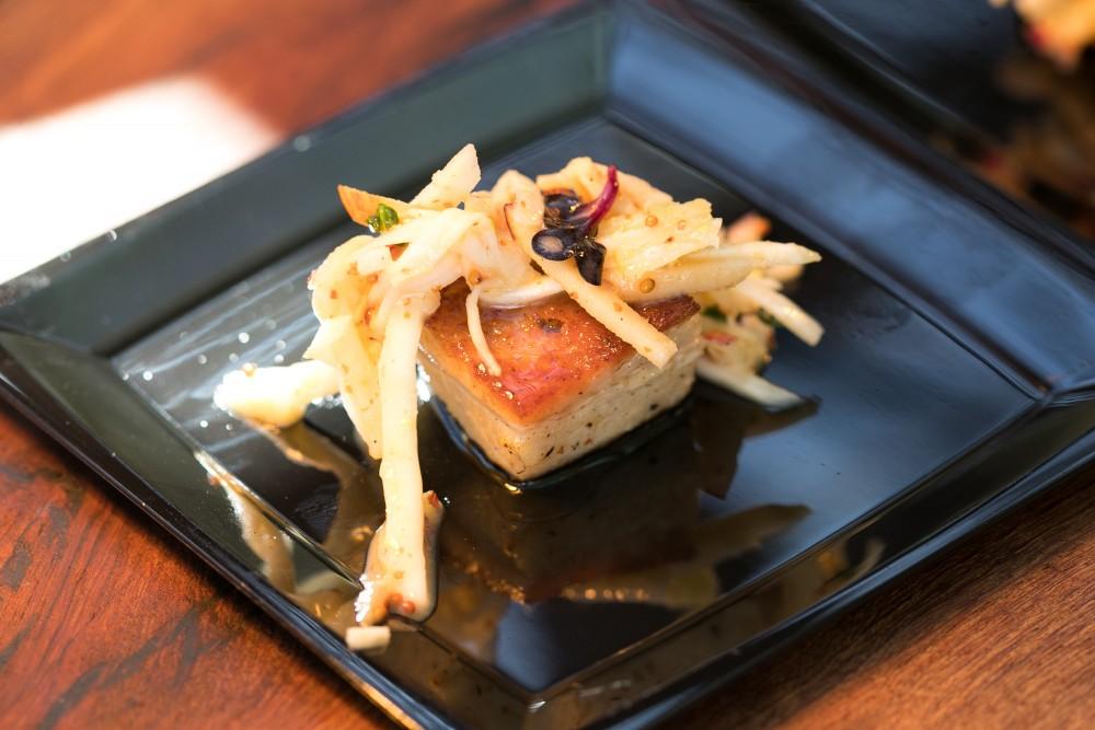 A Mustard-braised pork belly with apple-celery slaw and blood orange gastrique was one of many local samples during the SAVOR Food & Wine Festival.