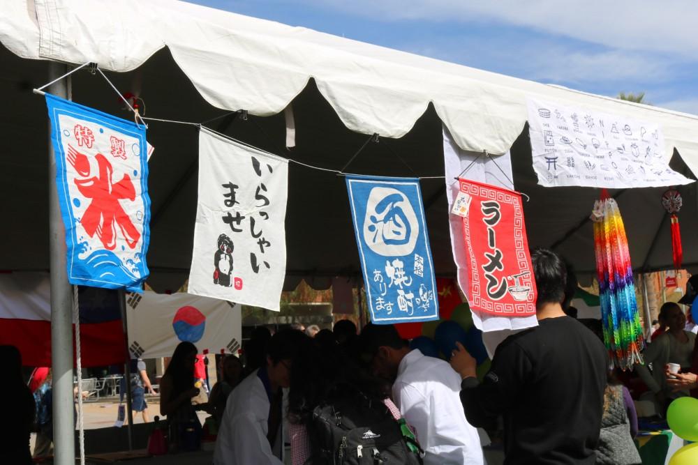 Flags hang from a tent on Feb. 13 during the annual CESL International festival.