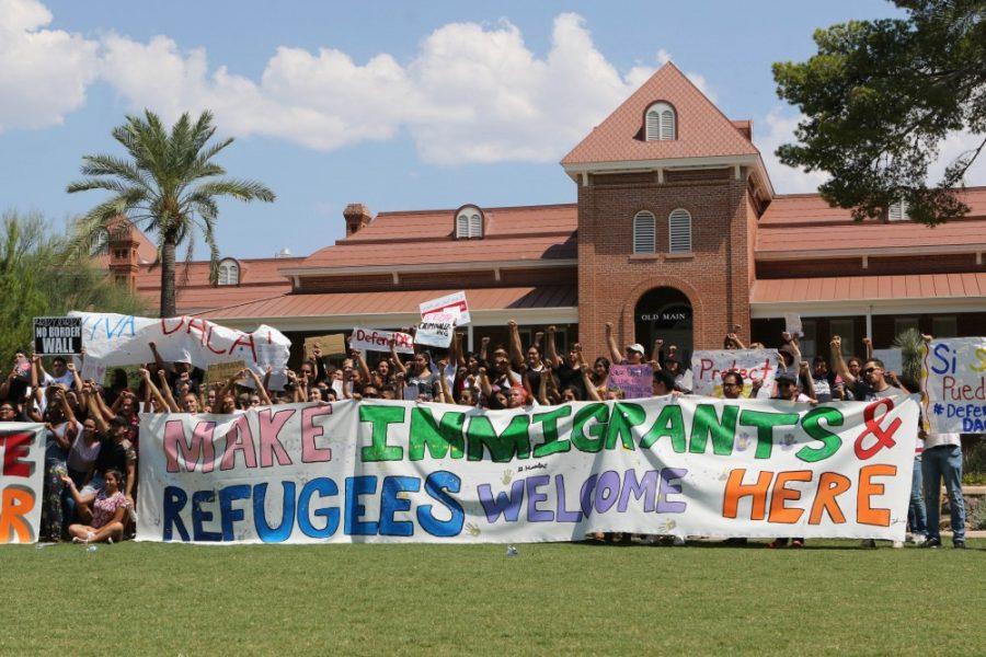 Protesters shout in unison during the pro-DACA protest on Sept. 5, 2017 in front of Old Main.