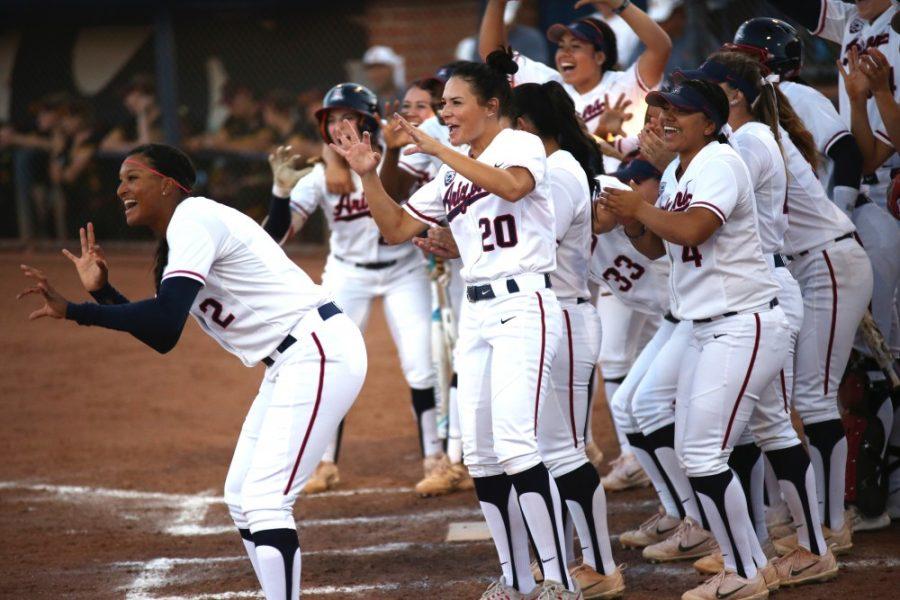 Arizonas softball team celebrates after a win against ASU on April 30, 2017.