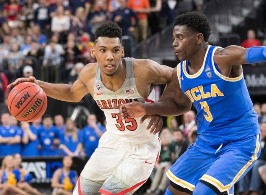 Arizonas Allonzo Trier pushes past UCLAs Aaron Holiday in the second half of the Arizona-UCLA Semifinal game at the 2018 Pac-12 Tournament on Friday, March 9 in T-Mobile Arena in Las Vegas, Nev.