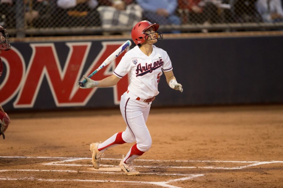 Arizonas  2nd baseman Reyna Carranco (5) finished through her swing during the Wildcats 9-1 win over the South Dakota State Coyotes on March 8, 2018 at Hillenbrand Memorial Stadium, Tucson, AZ. 