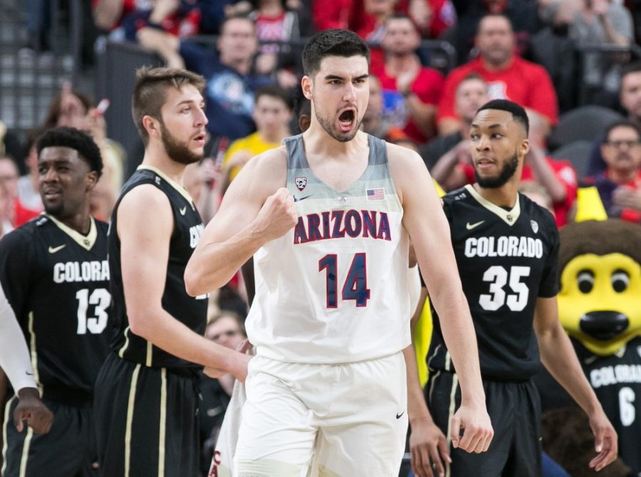 Arizonas Dusan Ristic celebrates after a foul is called on Colorado in the first half of the Colorado-Arizona Quarterfinal game at the 2018 Pac-12 Tournament on Thursday, March 8 in T-Mobile Arena in Las Vegas, Nev.