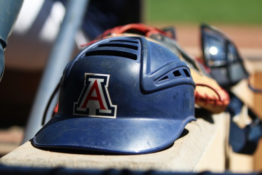 An Arizona baseball helmet rests on the wall of the Hi Corbett Field during a game against California on Sunday, May 28, 2017.