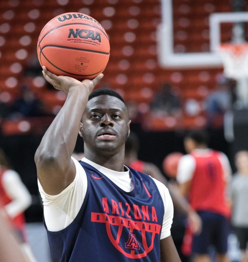 Rawle Alkins shoots one-handed from the foul line during an open practice in Boise, Idaho.
