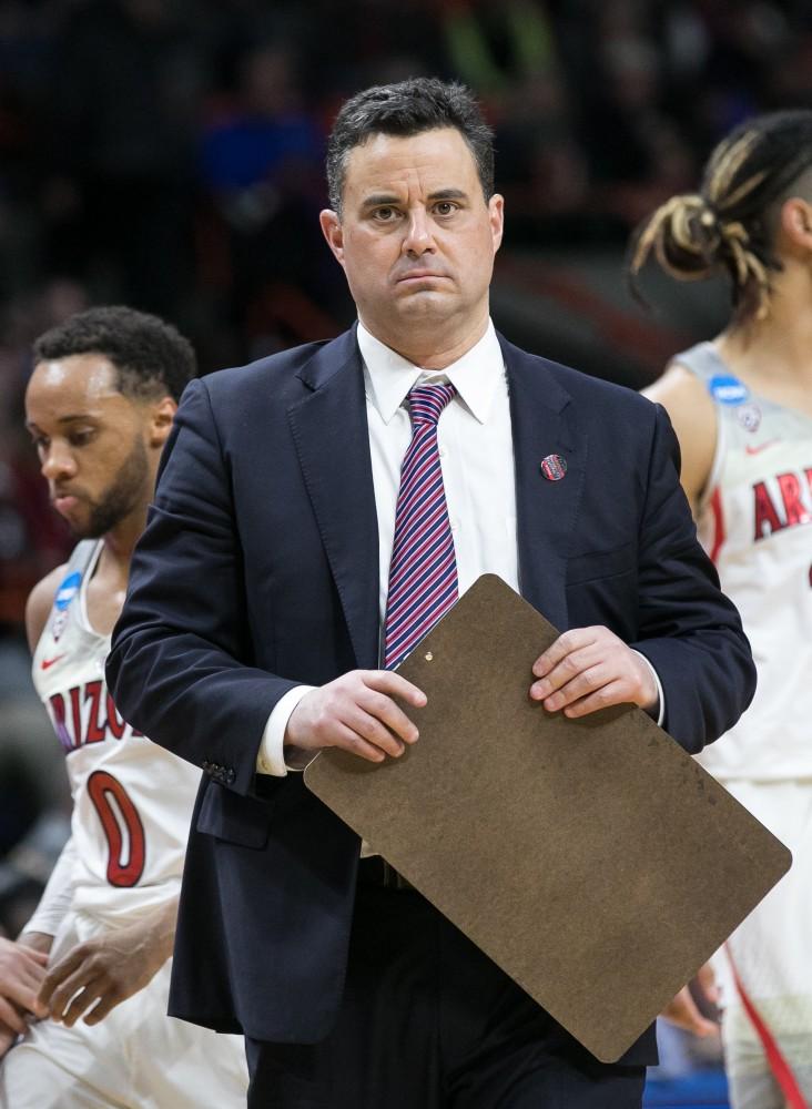 A dejected Sean Miller looks out onto the crowd in Boise, Idaho after a blowout loss to Buffalo in the first round of the NCAA Tournament on Thursday, March 15.