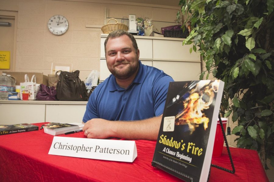 Christopher+Patterson+smiles+during+a+book+signing+of+Shadows+Fire%3A+A+Chance+Beginning.