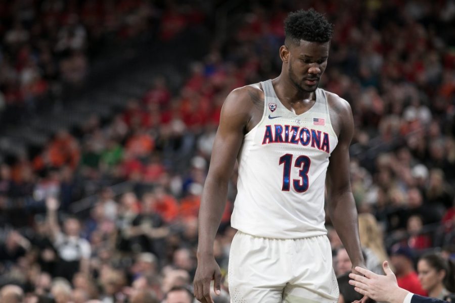 Arizonas+Deandre+Ayton+%2813%29+walks+to+the+bench+after+fouling+out+late+in+the+Colorado-Arizona+Quarterfinal+game+at+the+2018+Pac-12+Tournament+on+Thursday%2C+March+8+in+T-Mobile+Arena+in+Las+Vegas%2C+Nev.+Ayton+fouled+out+with+10+points+and+six+rebounds.