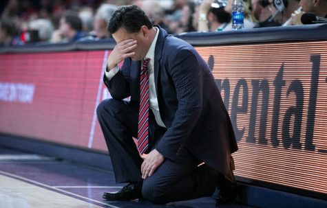 Arizona Men's Basketball Head Coach Sean Miller holds his head after a foul call during the Arizona-Stanford game on Thursday, March 1 at McKale Center in Tucson, Ariz.