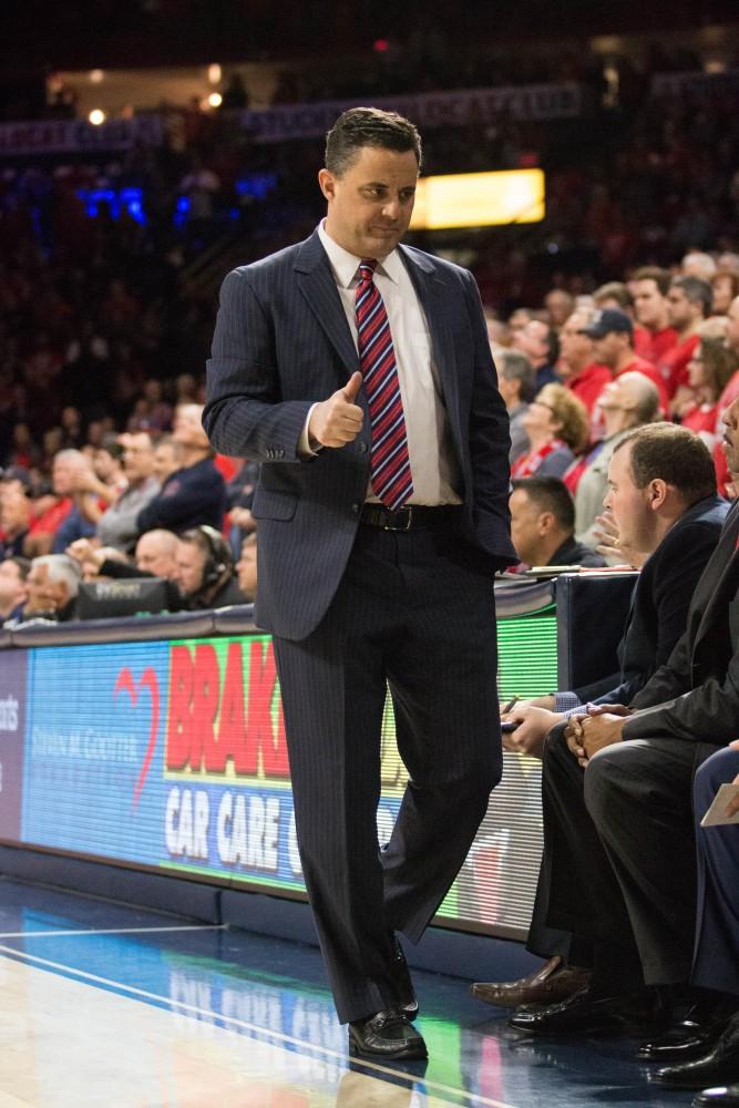 Arizona's head coach Sean Miller gives a thumbs up before the start of the Arizona-Stanford game on Thursday March 1 at McKale Center.