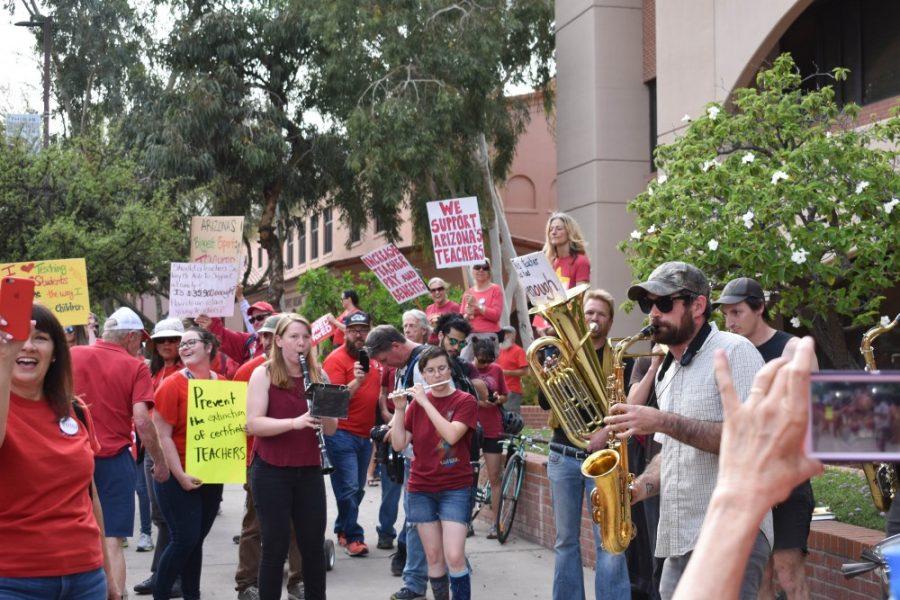 A band plays during the RED for ED protest on April 4, in downtown Tucson.