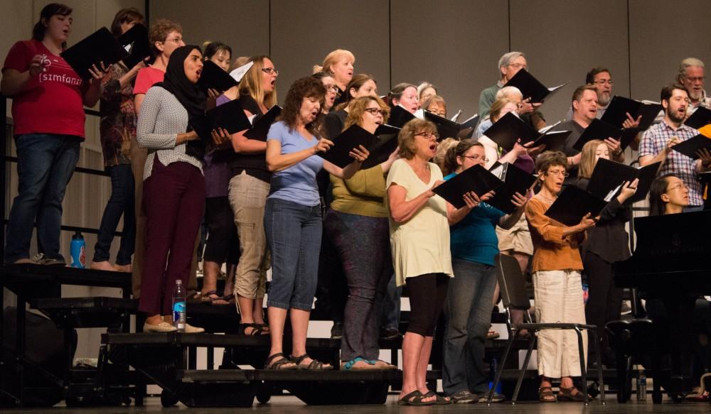 The UA Community Chorus practices during their dress rehersal on Saturday April 14 at the Crowder Hall at the UA.