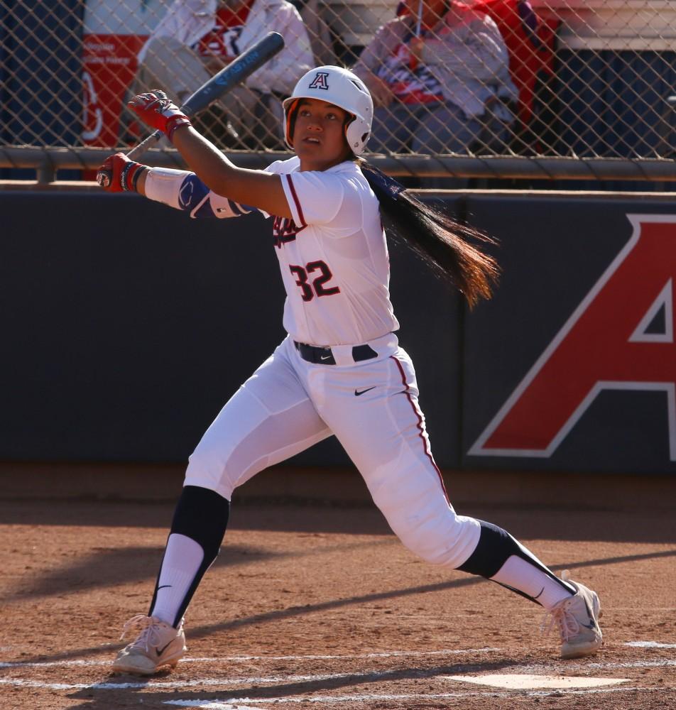 Arizona's Alyssa Palomino (32) watches the ball fly into left field during the Arizona-New Mexico State game at the Rita Hillenbrand Memorial Stadium on Wednesday April 18 in Tucson Ariz.